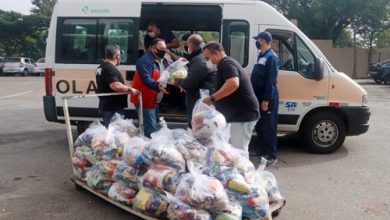 Doação cestas - transportadores escolares - Foto - Helber Aggio